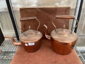 TWO LARGE VINTAGE COPPER KETTLES