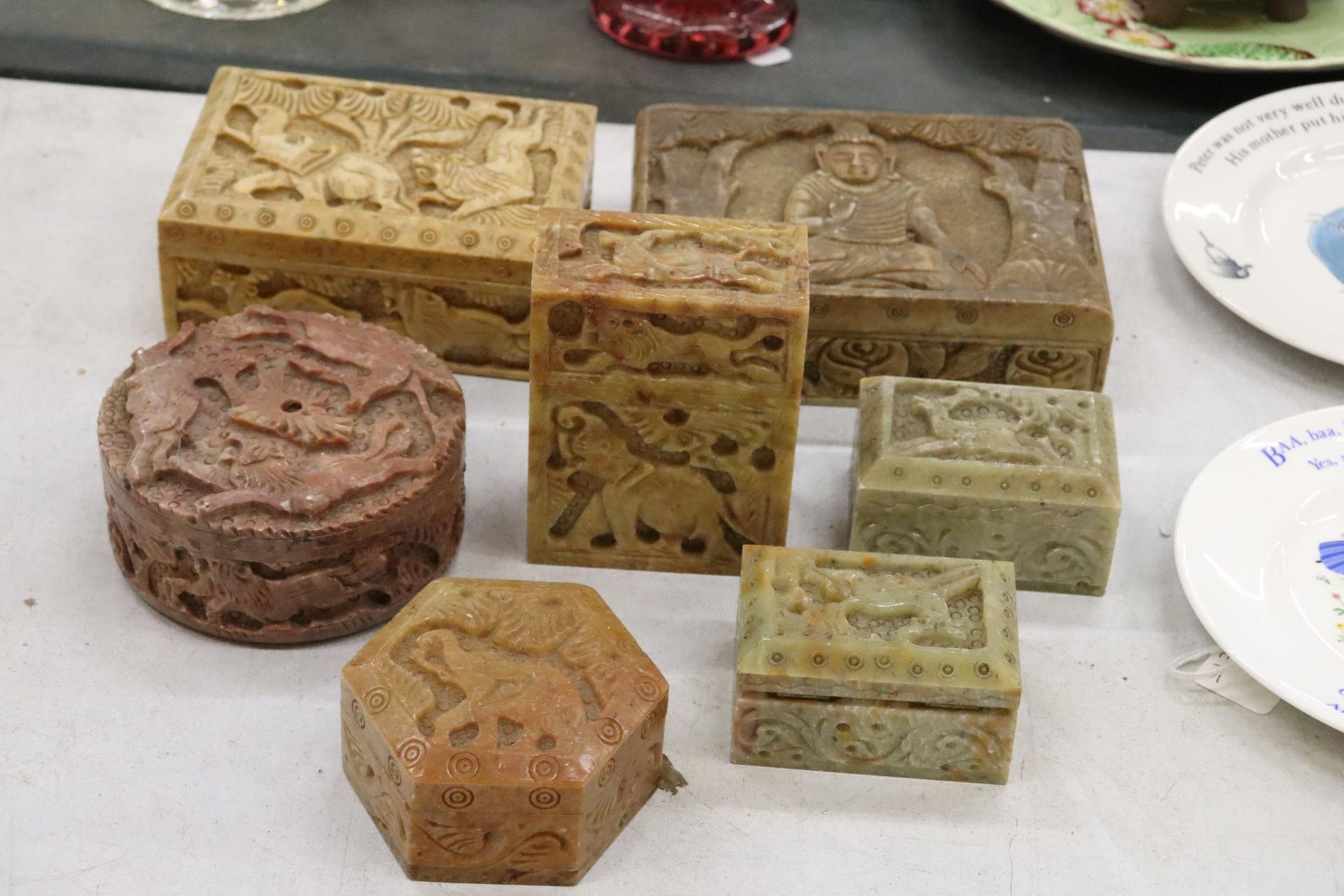 SEVEN SOAP STONE BOXES WITH ANIMAL AND ORIENTAL DDESIGN