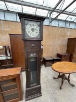 AN EARLY 20TH CENTURY OAK ELECTRIC LONGCASE CLOCK WITH BLACK AND WHITE FACE HAVING ROMAN NUMERALS