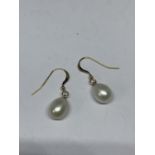 A PAIR OF 14 CARAT GOLD AND PEARL EARRINGS GROSS WEIGHT 2.45 GRAMS