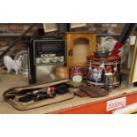 A MIXEDVINTAGE LOT TO INCLUDE TINS, AN AJAX RADIO, A GENTLEMEN'S GROOMING KIT, SMALL CUPBOARD, ETC