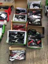TEN PAIRS OF AS NEW AND BOXED SPORTS BOOTS AND TRAINERS