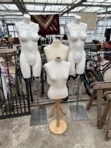 FOUR VARIOUS SHOP MANNEQUINS ON STANDS