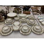 A NORITAKE PART DINNER SERVICE TO INCLUDE A SERVING BOWL AND PLATE, VARIOUS SIZES OF PLATES, CREAM