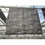 A MODERN GREY SHAGGY LEOPARD PRINT RUG