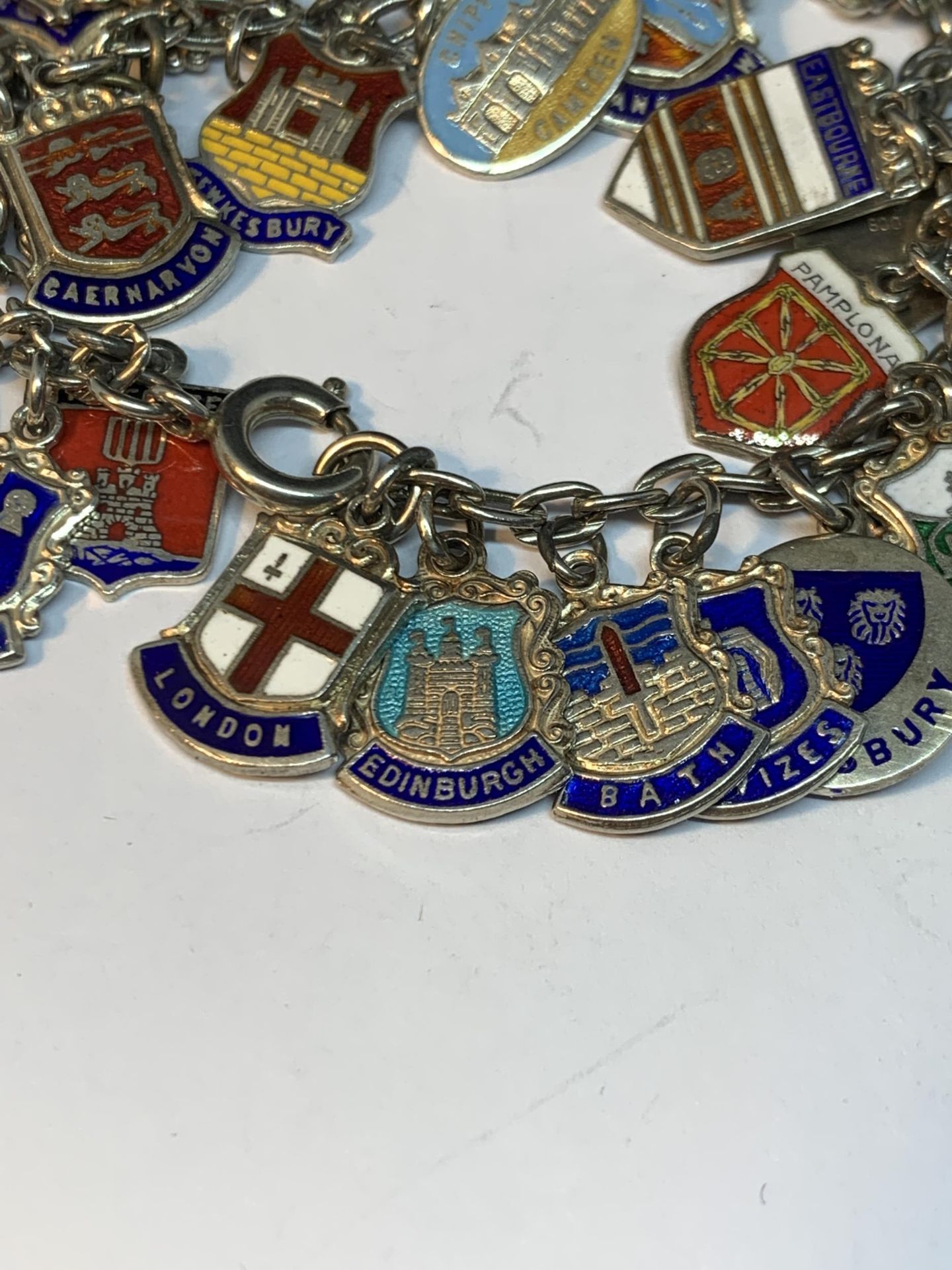 A SILVER CHARM BRACELET WITH FORTY ENAMEL PLACE NAME CHARMS - Image 5 of 6