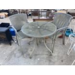 A METAL BISTRO TABLE AND FOUR CHAIRS