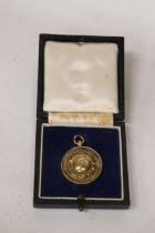 A BIRMINGHAM HALLMARKED SILVER 'THE FOOTBALL LEAGUE REPRESENTITIVE MATCH' MEDAL PRESENTED TO A