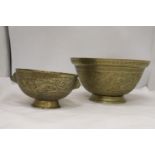 TWO HEAVY BRASS BOWLS WITH ORIENTAL DRAGON DESIGN ONE WITH LION HEAD FEATURES