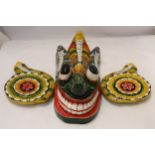 A HAND PAINTED AND HAND CARVED GUATEMALAN DEVIL GOD, 18 INCHES X 12 INCHES