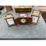 THREE VARIOUS CLOCKS TO INCLUDE TWO BRASS CARRIAGE CLOCK AND AN OAK CASED CLOCK