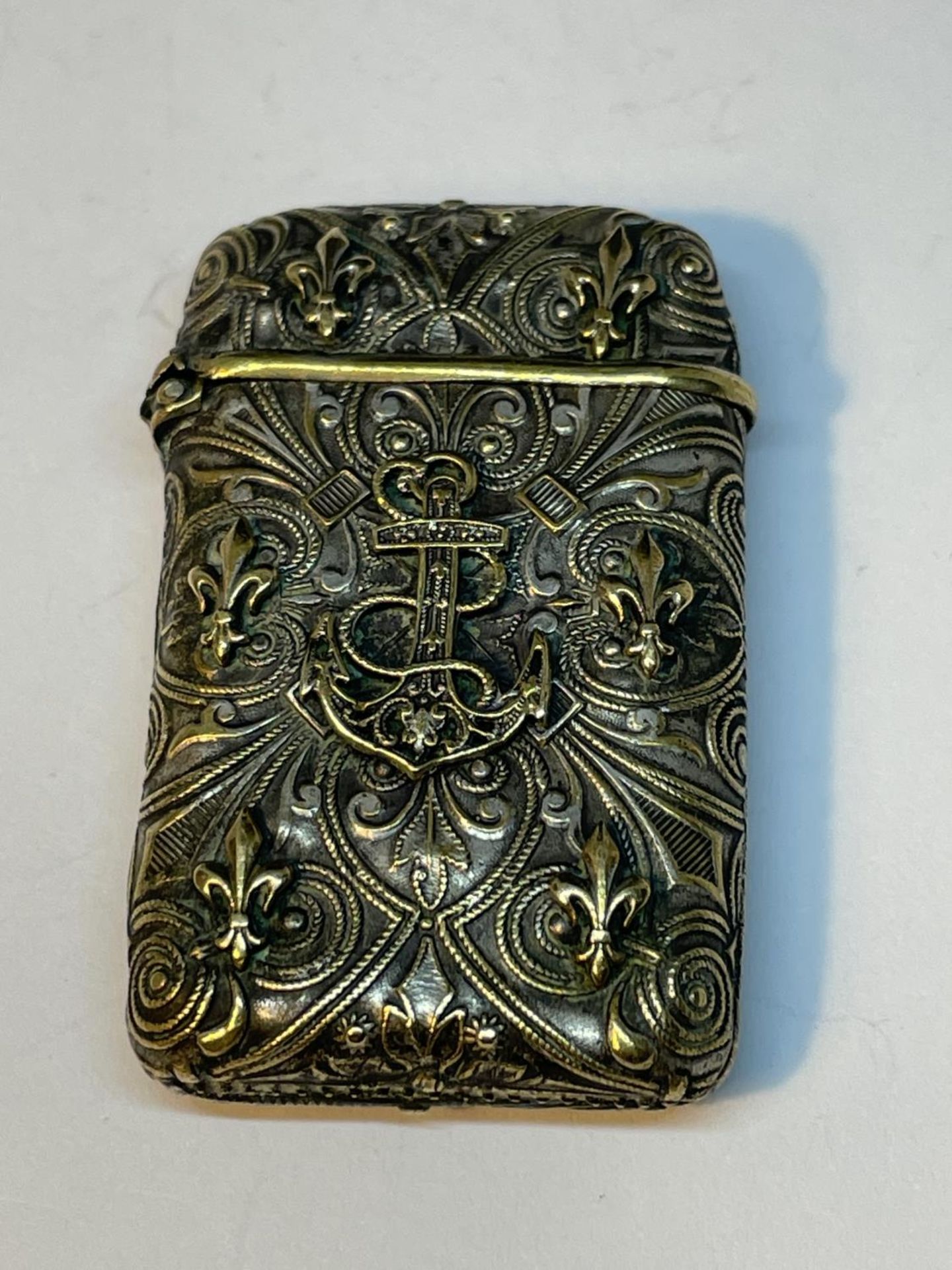 A DECORATIVE NAVAL VESTA CASE