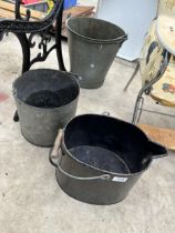 A VINTAGE GALVANISED BUCKET AND TWO FURTHER METAL BUCKETS