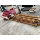 A LARGE ASSORTMENT OF CURTAIN POLES, CURTAINS AND FITTINGS ETC