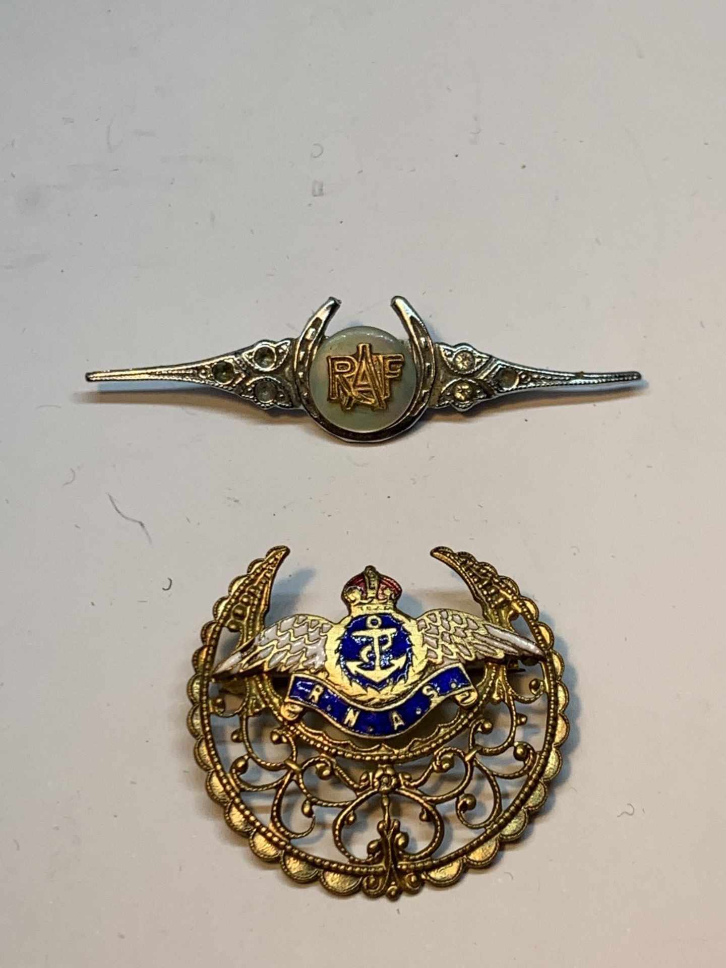 TWO LAPEL BADGES ONE R.A.F THE OTHER R.N.A.S