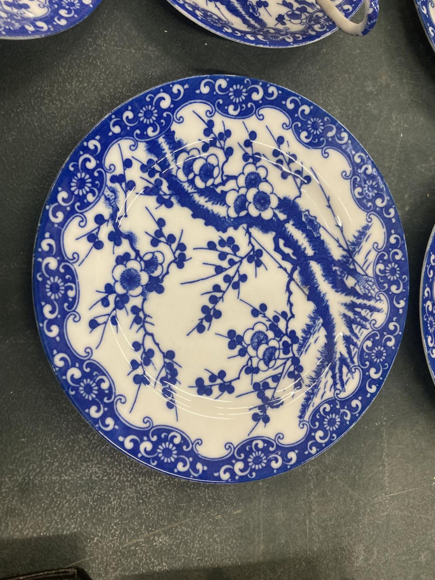 FIVE BLUE AND WHITE ORIENTAL EGGSHELL TEACUPS, SAUCERS AND FIVE SIDE PLATES - Image 4 of 5