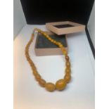 A BALTIC BUTTERSCOTCH AMBER NECKLACE IN A PRESENTATION BOX