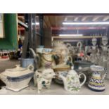 A COLLECTION OF VARIOUS CERAMIC JUGS AND TEAPOTS ETC