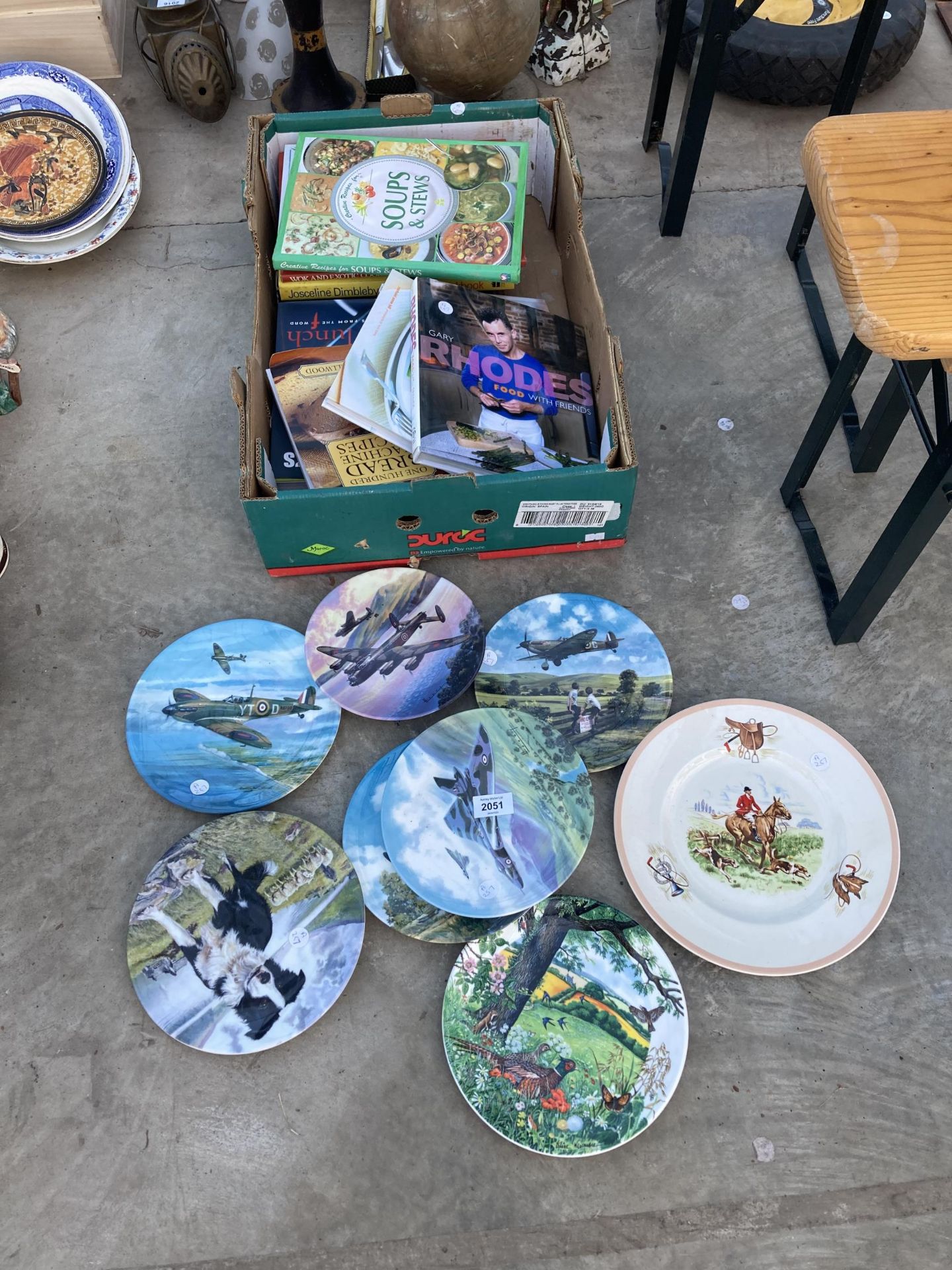 AN ASSORTMENT OF BOOKS AND COLLECTORS PLATES