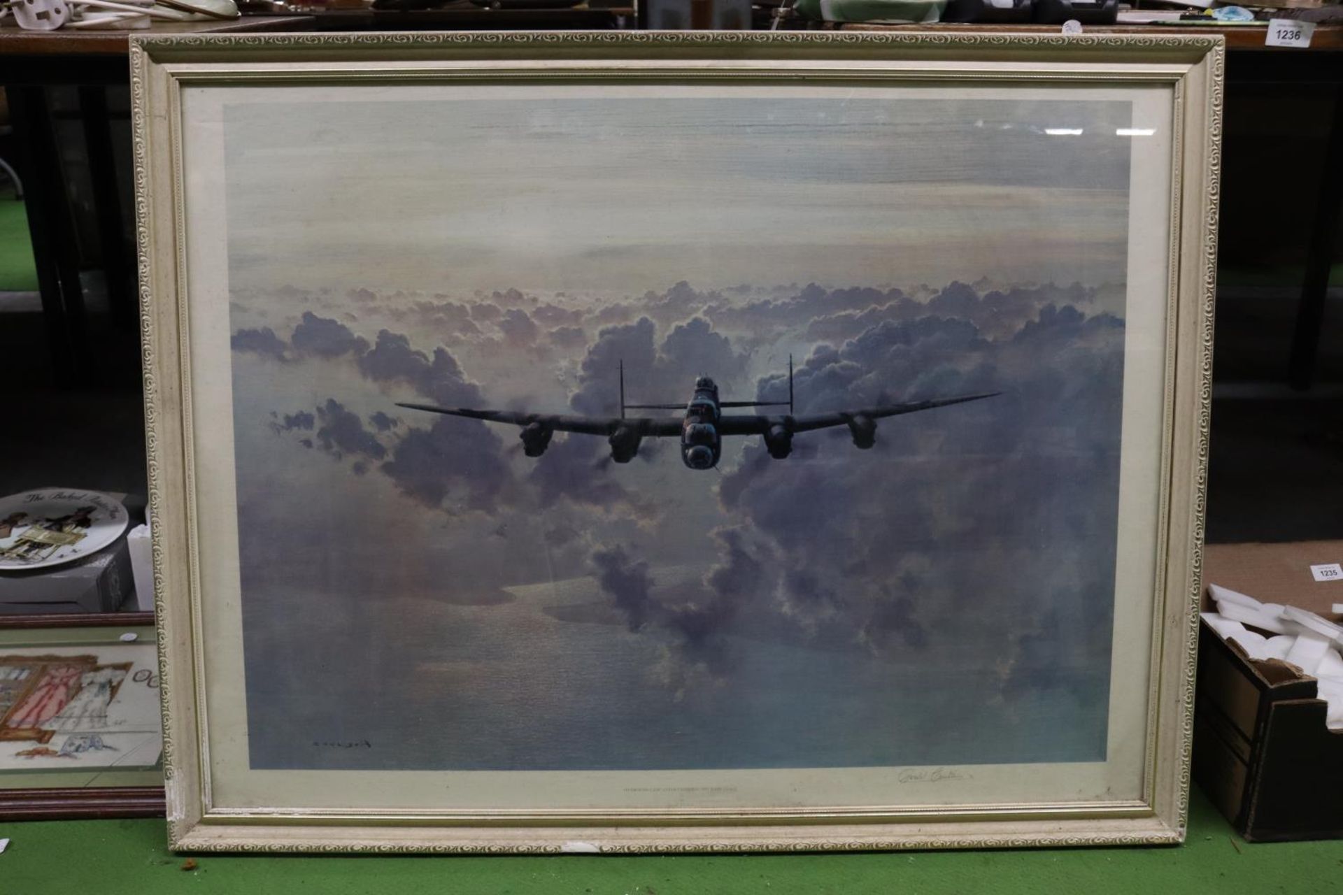 A LARGE PRINT, 'OUTBOUND LANCASTER CROSSING THE EAST COAST', SIGNED GERALD COULSON, 90CM X 70CM