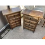 A PAIR OF HARDWOOD CHESTS OF FIVE DRAWERS 23" WIDE