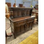 A REPRODUCTION OAK COURT CUPBOARD WITH CARVED UPPER PANEL DOORS 51" WIDE