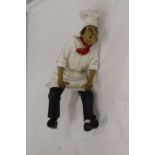 A FIGURE OF A CHEF, HEIGHT 30CM