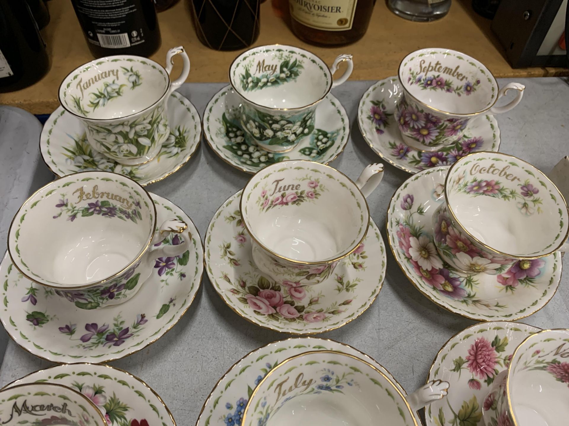 A COMPLETE SET OF ROYAL ALBERT FLOWER OF THE MONTH CUP AND SAUCERS - Image 2 of 5