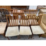A SET OF SIX LATH BACK DINING CHAIRS