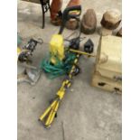 A KARCHER PRESSURE WASHER AND A TRIPOD WORKLIGHT BELIEVED IN WORKING ORDER BUT NO WARRANTY