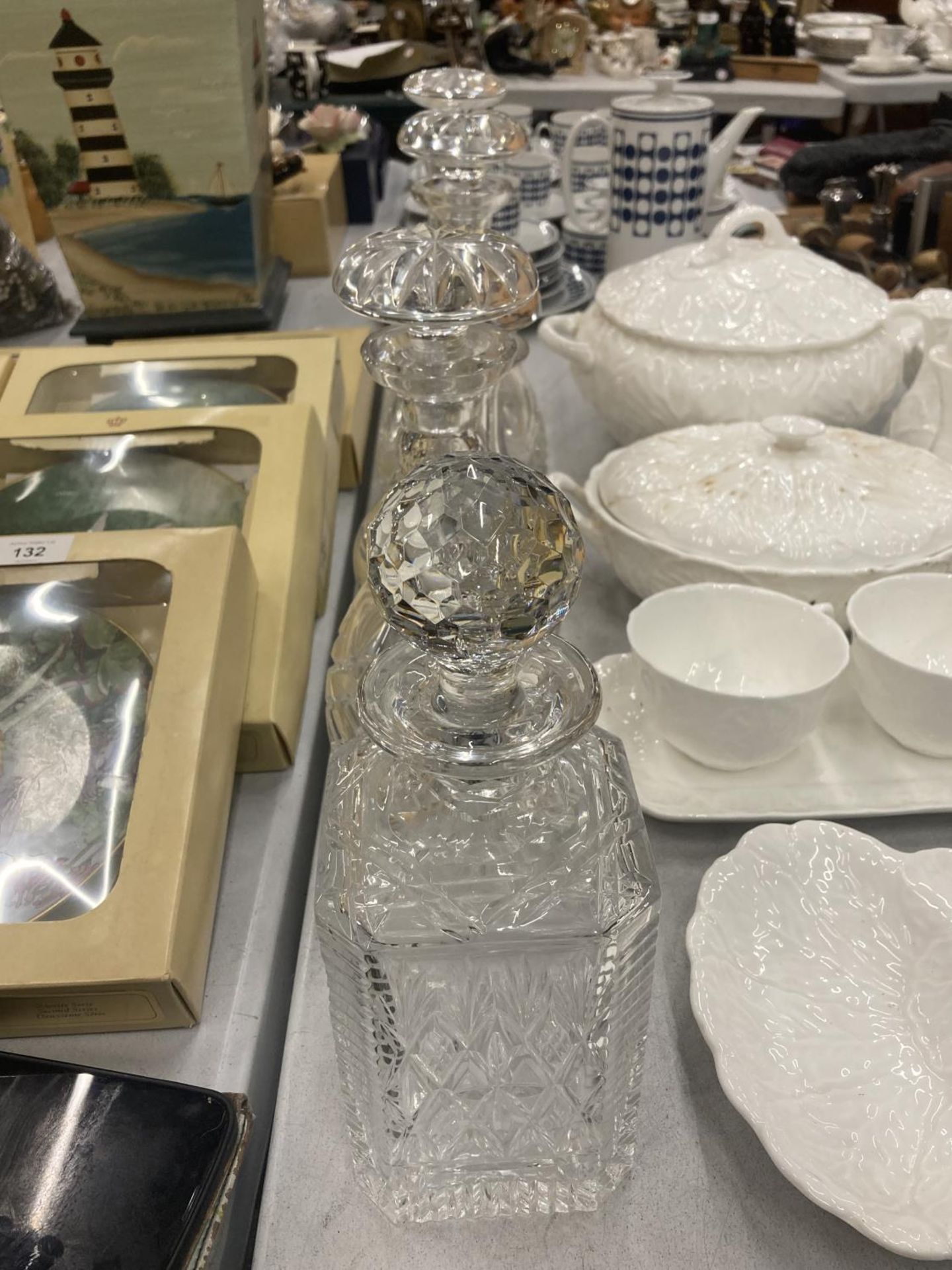 FIVE CUT GLASS DECANTERS