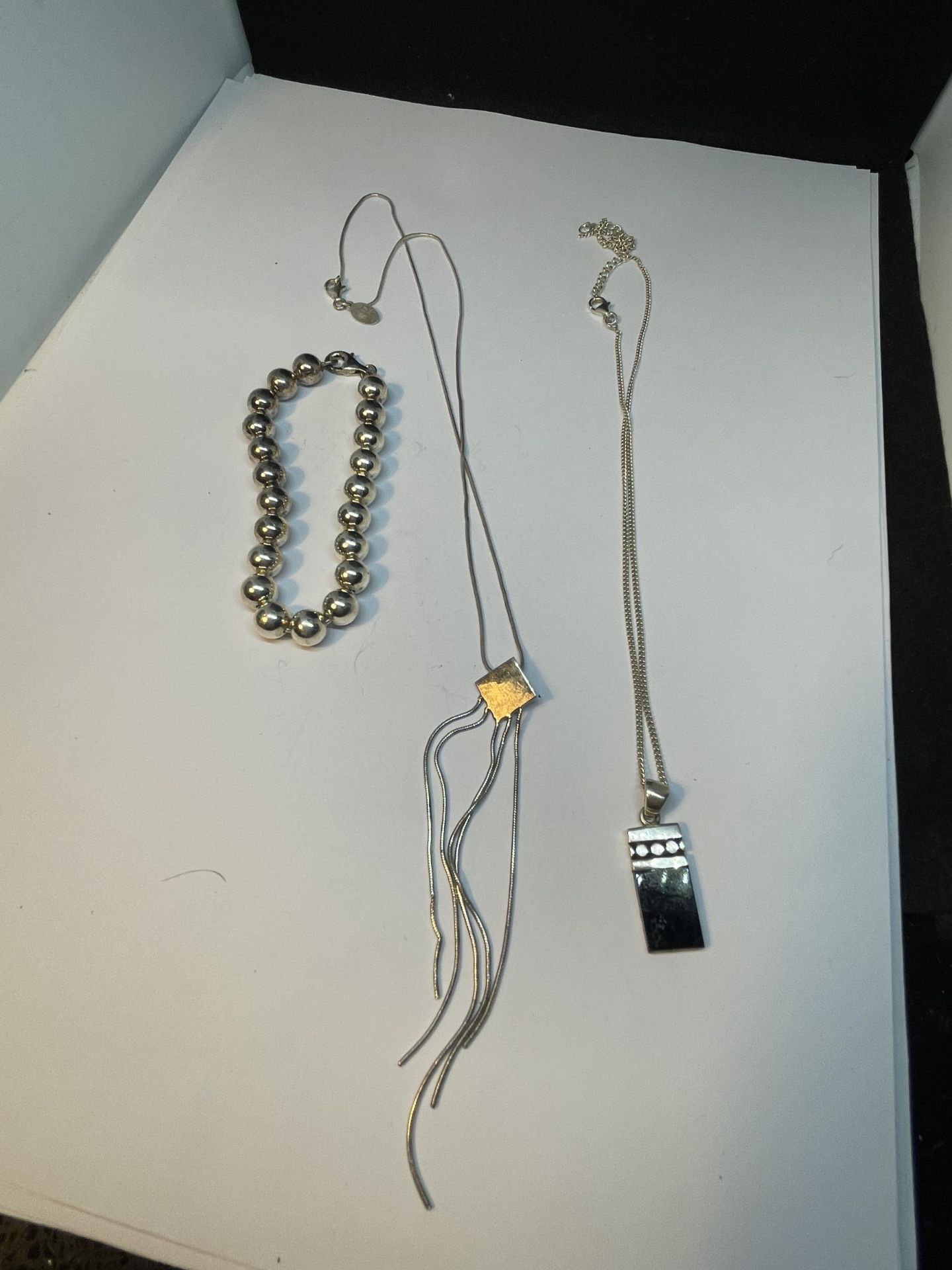 THREE MARKED 925 SILVER ITEMS TO INCLUDE TWO NECKLACES AND A BRACELET