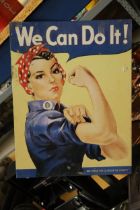 A METAL SIGN, 'WE CAN DO IT', 31CM X 41CM