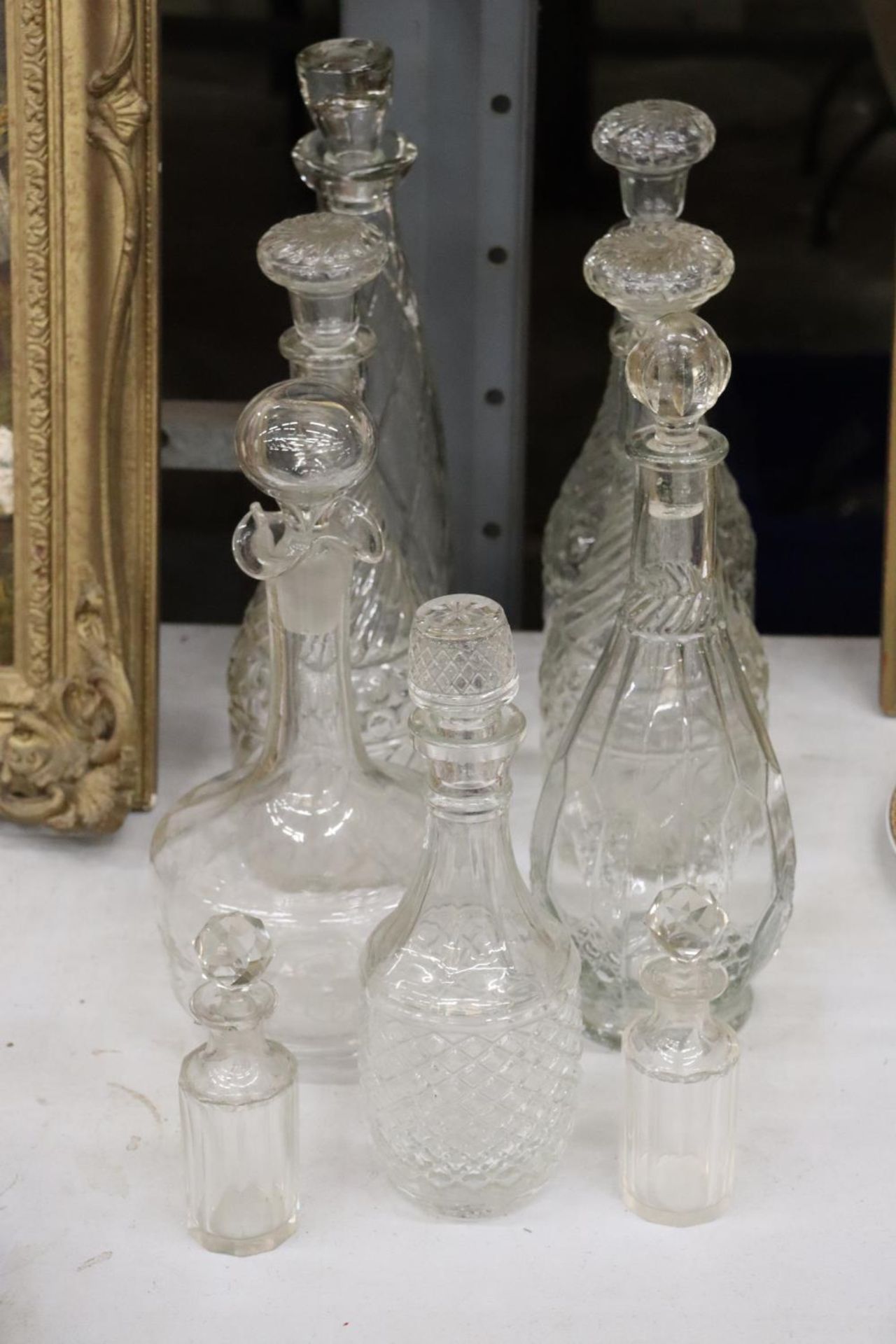 A QUANTITY OF VINTAGE DECANTERS - 9 IN TOTAL PLUS TWO SCENT BOTTLES