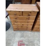 A PINE CHEST OF TWO SHORT AND FIVE LONG DRAWERS 30" WIDE