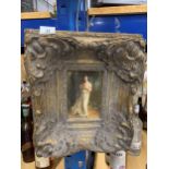 A HEAVY GILT FRAMED PAINTING OF A YOUNG GIRL WITH A GIFT BOX