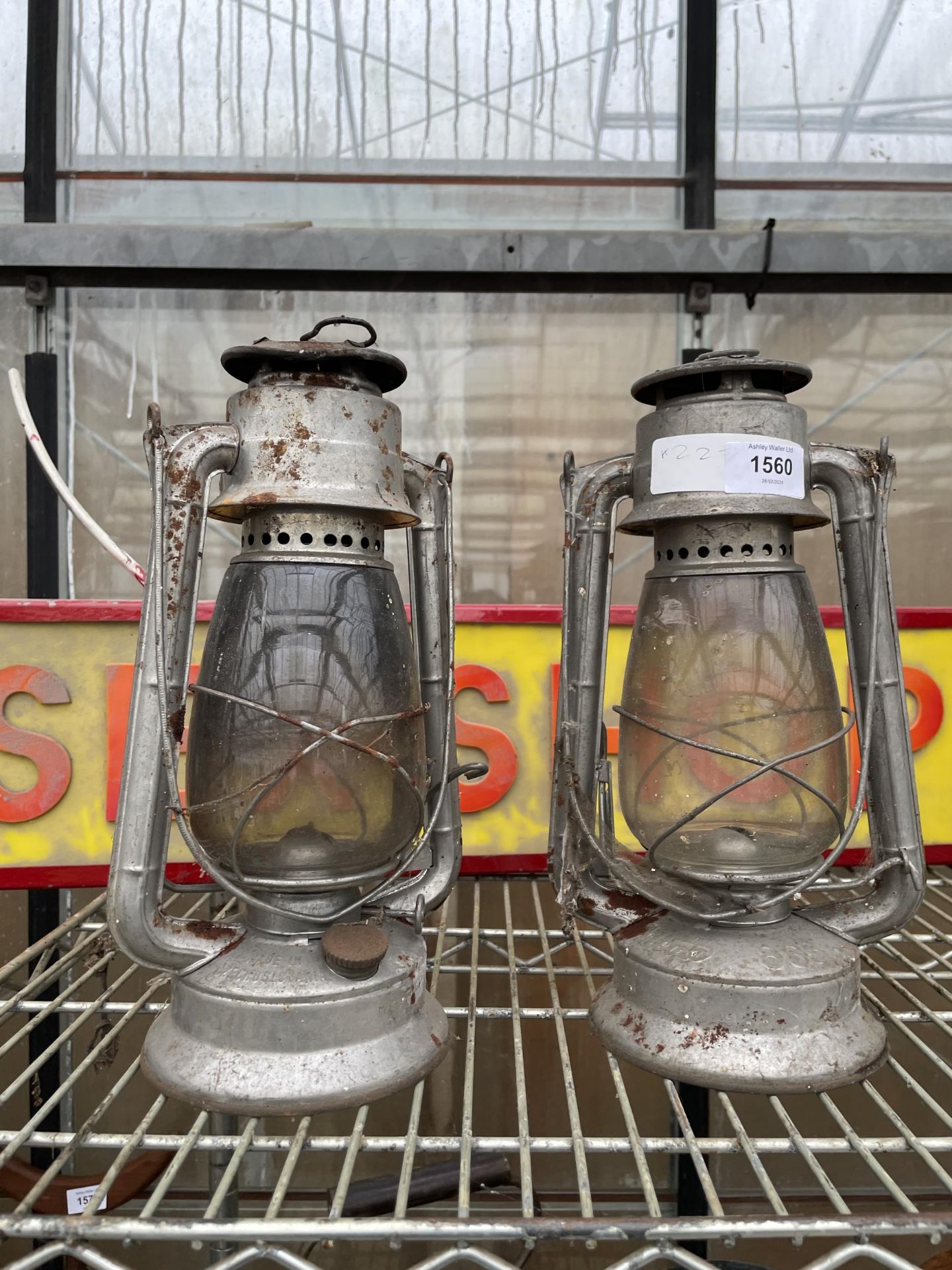 A PAIR OF VINTAGE PARAFIN LAMPS