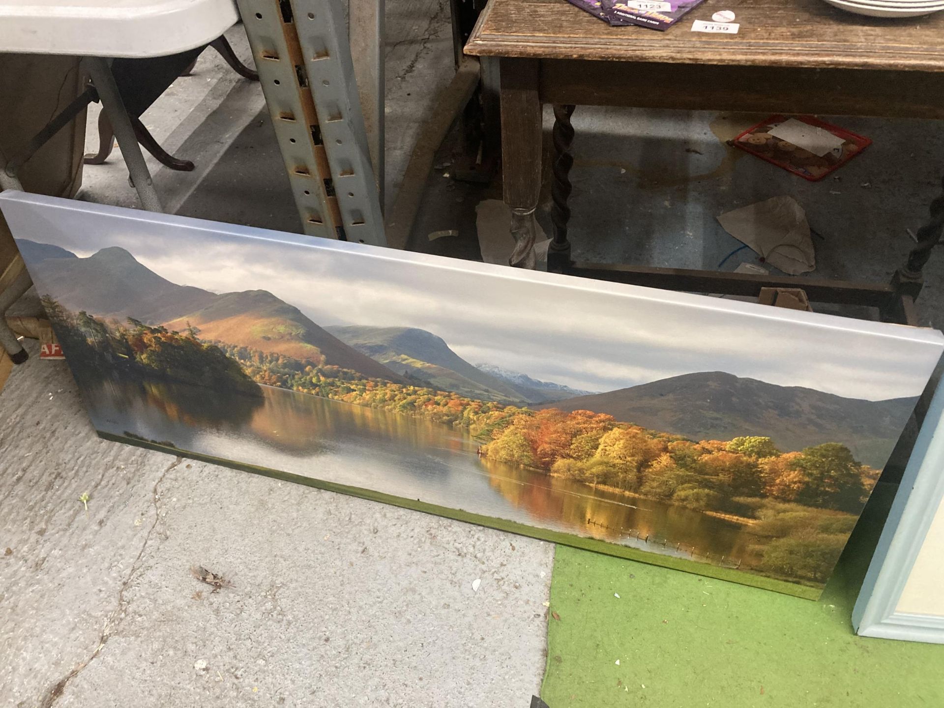 A LONG CANVAS OF AN AUTUMN MOUNTAIN AND RIVER SCENE