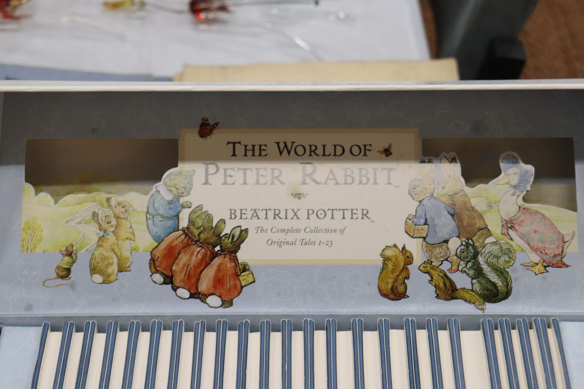 A BOXED 'THE WORLD OF PETER RABBIT' COLLECTION OF BOOKS PLUS THREE PIECES OF WEDGWOOD PETER RABBIT - Image 6 of 8