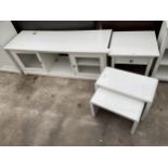 A MODERN WHITE LOW UNIT , NEST OF TWO TABLES AND BEDSIDE TABLE