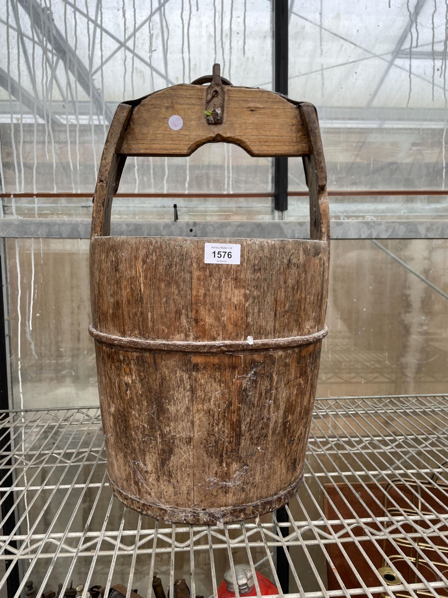 A VINTAGE OAK PAIL BUCKET WITH IRON BANDING AND LOOP