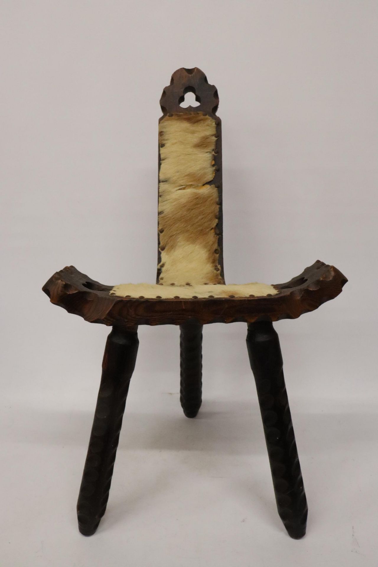 AN AFRICAN ANIMAL HIDE, WOODEN CHAIR - Image 6 of 6