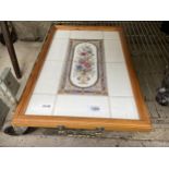 A PINE AND TILED SERVING TRAY WITH BRASS HANDLES