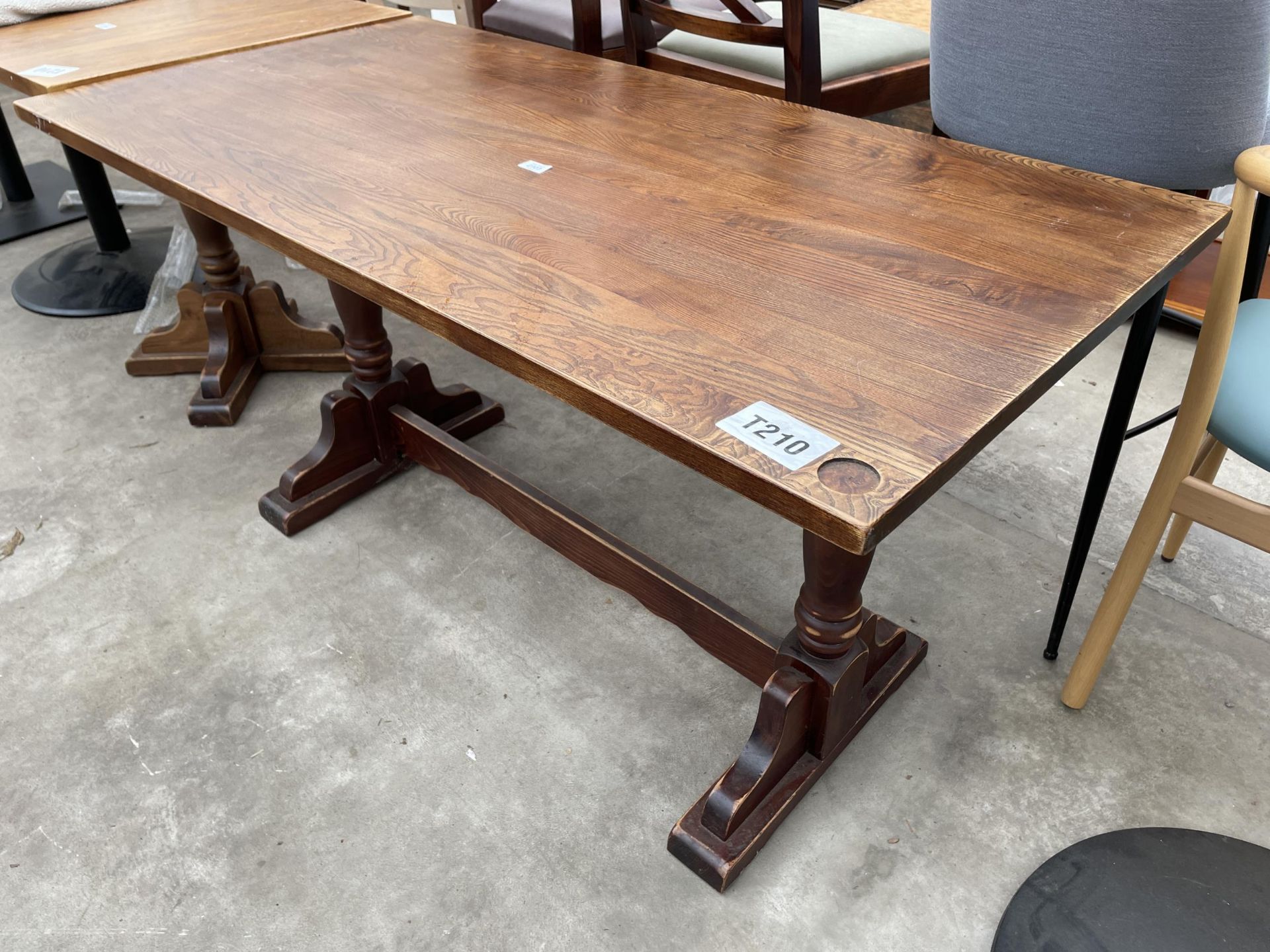 A REFRECTORY STYLE OAK PUB TABLE 55" X 28" - Image 2 of 3