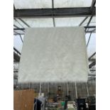 A MODERN SHAGGY WHITE THROW