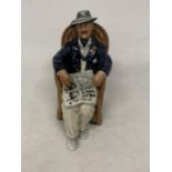 A ROYAL DOULTON TAKING THINGS EASY FIGURE