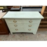 A GREEN PAINTED OAK CHEST OF TWO SHORT AND TWO LONG DRAWERS WITH SCOOP HANDLES 42" WIDE