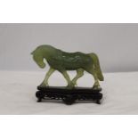 A JADE HORSE ON STAND