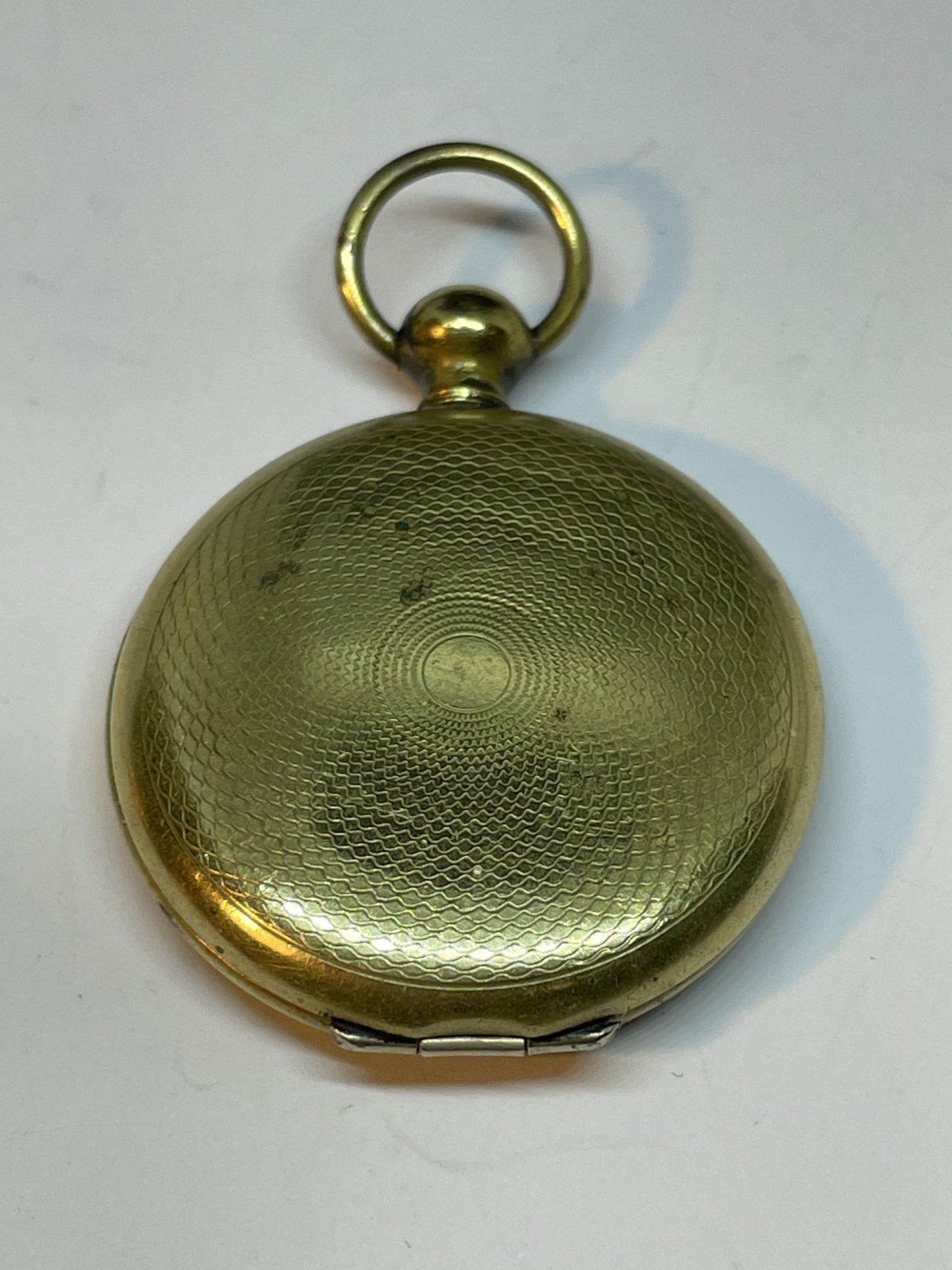 A VINTAGE LOCKET/COIN CASE