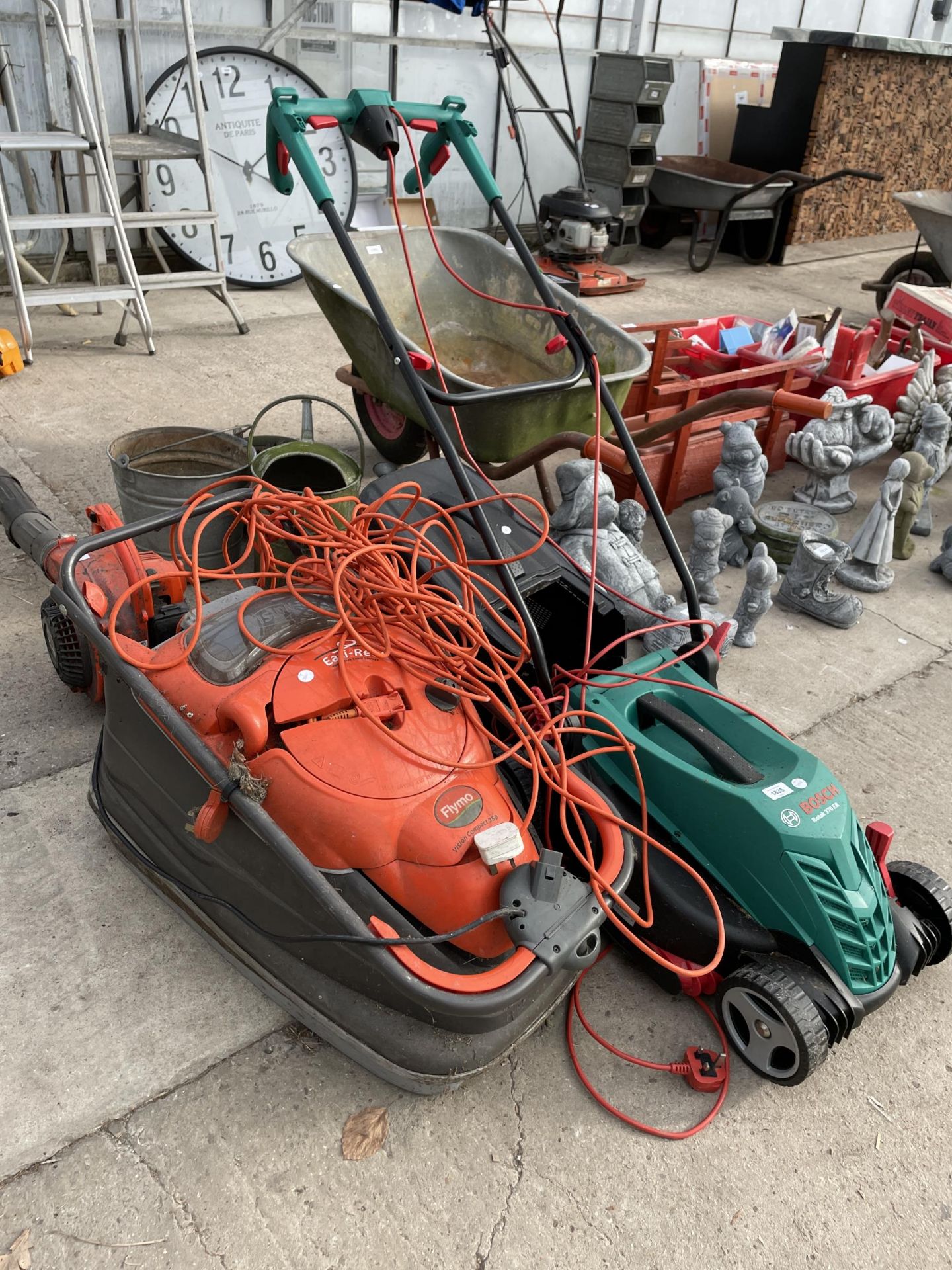 A BOSCH ROTAK 370 ER ELECTRIC LAWN MOWER AND AN ELECTRIC FLYMO